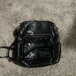 Black backpack purse